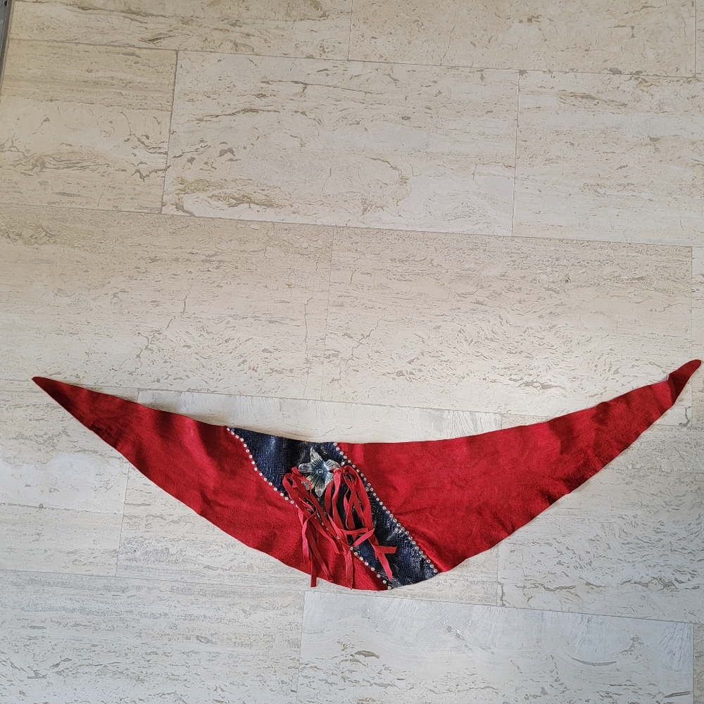 Red suede wrap belt with navy leather  diagonal with metal studs and embellishme